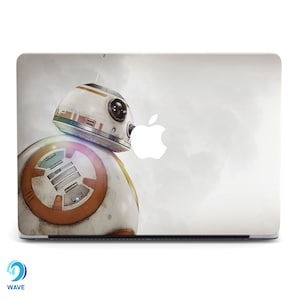 May include: A white laptop skin with a white and orange robot character on the left side of the image. The robot has a large round body with a smaller round head. The robot's head has two large black eyes. The robot is facing the right side of the image. The laptop skin has a white Apple logo on the right side of the image.