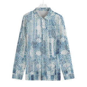 Puede incluir: Una camisa de manga larga con botones, fondo blanco y estampado geométrico azul y verde.