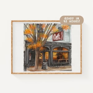 May include: Watercolor painting of a coffee shop with a sign that reads "Quills Coffee." The shop has a black awning and a tree with orange leaves in front. A sign says "Ready in 48 hours!"