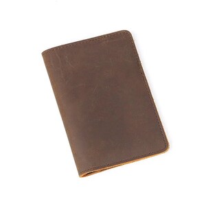 Cartera de viaje de cuero hecha a mano. Viaje con estilo con esta elegante funda para pasaporte de cuero Fabricada con cuero de alta calidad.