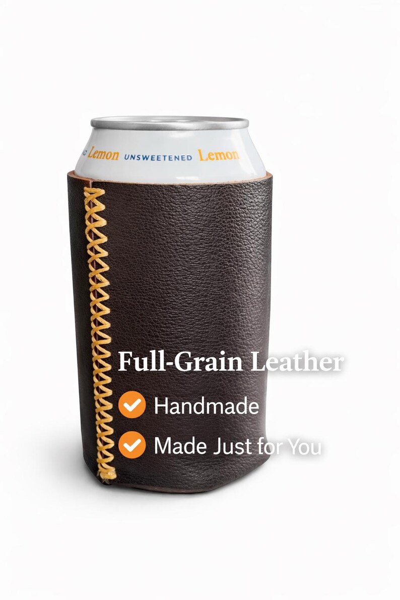 May include: A dark brown full-grain leather can cooler with a yellow stitched seam. The can cooler has the words "Full-Grain Leather", "Handmade", and "Made Just for You" printed on it. A can of unsweetened lemon beverage is inside.
