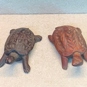 Vintage carved wooden turtle pair