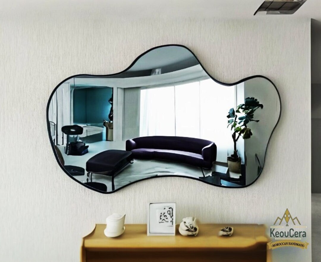 "Asymmetrical Designs: Adding Artistic Flair with Unique Mirror Shapes"