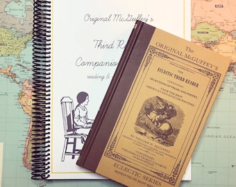 May include: A brown leather-bound book titled "The Original McGuffey's Eclectic Third Reader" with gold lettering. The book contains selections of prose and poetry from American and English writers. The book is open to reveal a black and white illustration of a person riding a horse.