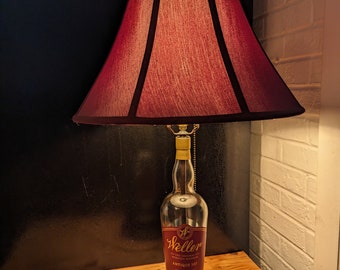 Weller bourbon whiskey lamp with metal base
