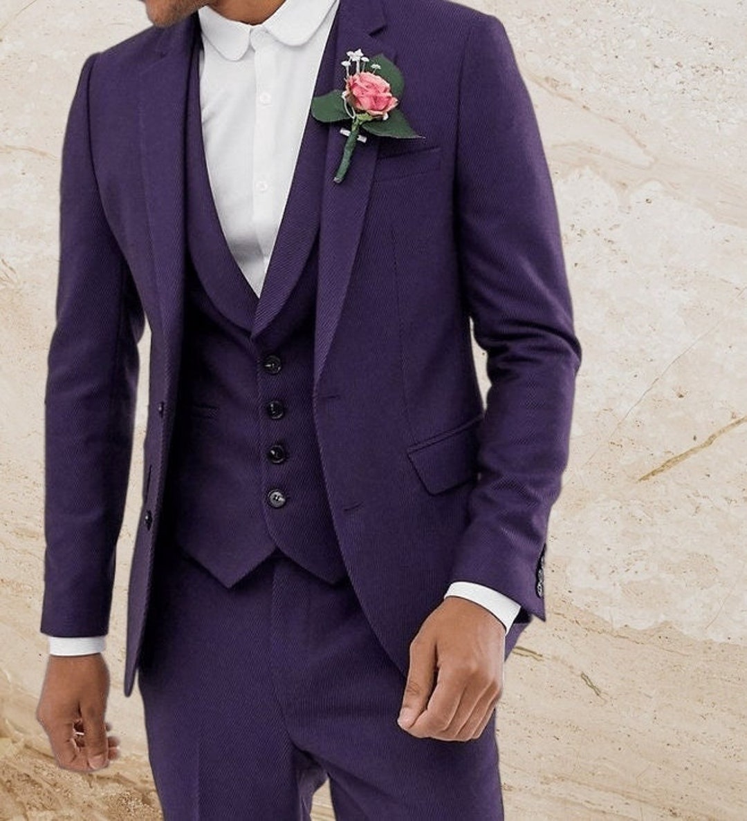 mens suit with purple tie