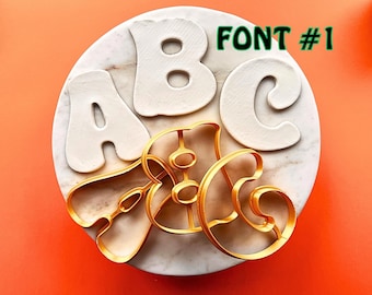 Jeu d'estampes alphabet, pâte à modeler et emporte-pièce
