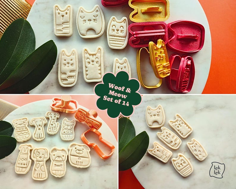 May include: A set of 14 cookie cutters in the shape of cats and dogs. The cutters are in various colors, including red, yellow, and orange. The cookies are beige and have detailed designs. The text "Woof & Meow Set of 14" is visible.