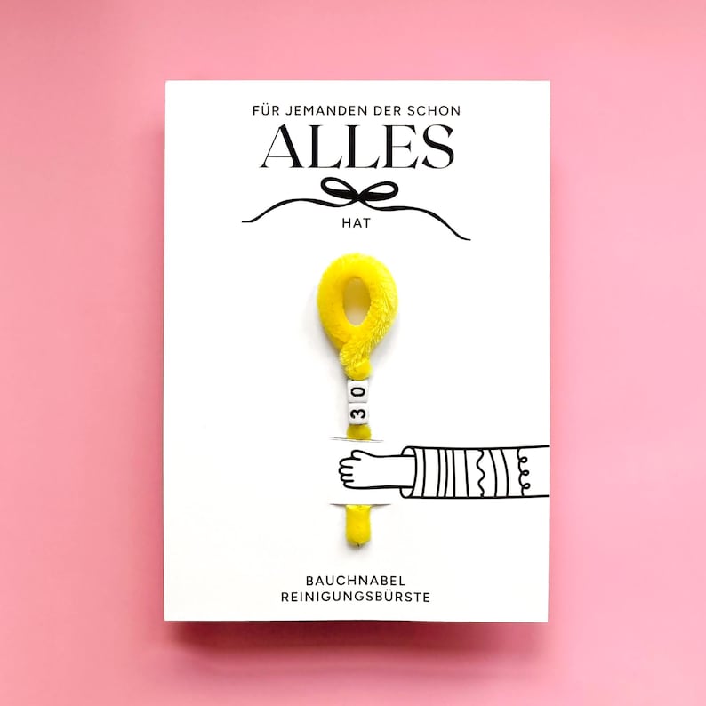 May include: A white card with the German text "F&Uuml;R JEMANDEN DER SCHON ALLES HAT" and "BAUCHNABEL REINIGUNGSB&Uuml;RSTE". The card features a yellow fluffy object with the number "30" and a cartoon hand.