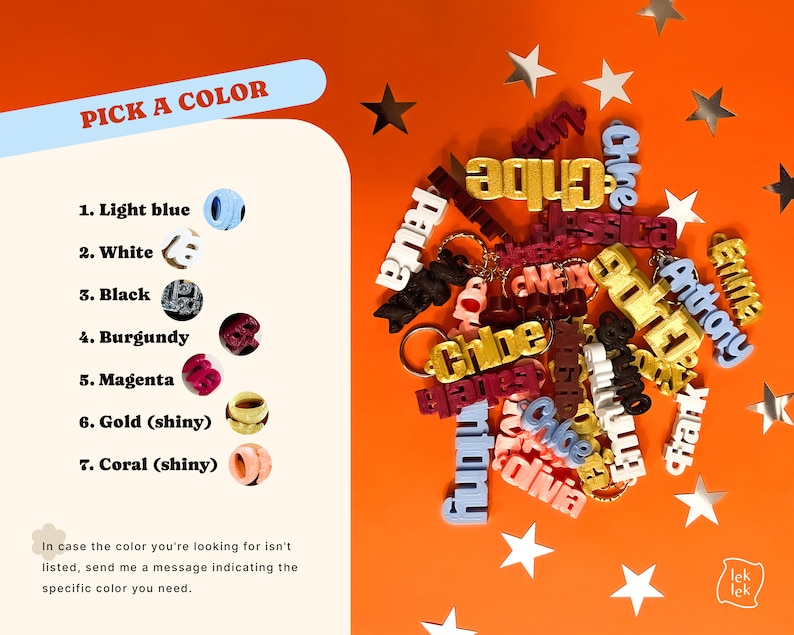May include: A variety of personalized keychains in different colors, including light blue, white, black, burgundy, magenta, gold, and coral. The keychains are made of plastic and have a shiny finish. The keychains are arranged on a bright orange background with silver stars.