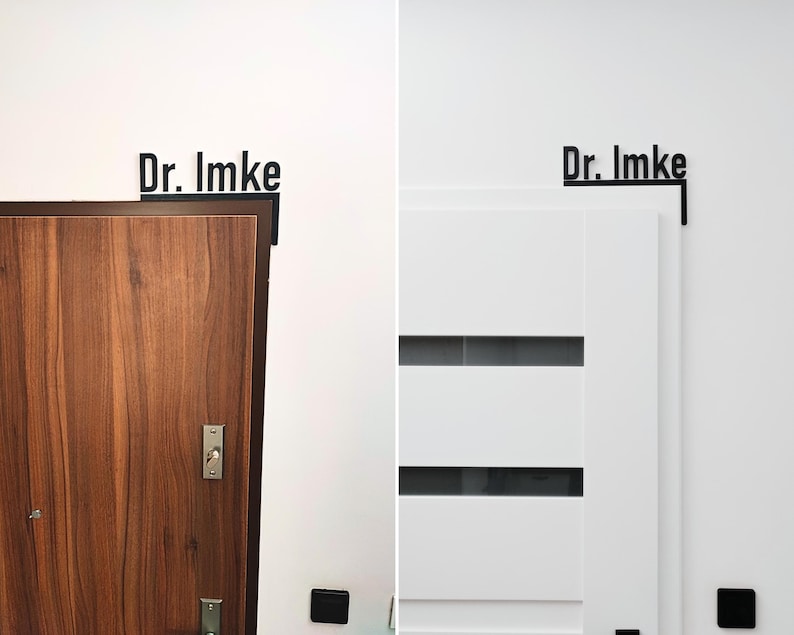 May include: Black metal sign with the text "Dr. Imke" mounted above a wooden door and a white door. The sign is in a sans-serif font. The wooden door has a dark brown frame and silver hardware. The white door has horizontal glass panels.