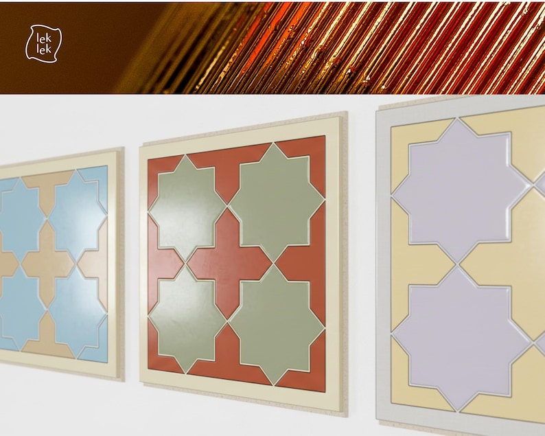May include: Three framed wall art pieces with geometric star patterns in various colors. The frames are light beige, and the star patterns include blue, beige, red, green, and yellow. The artwork is displayed on a white wall.