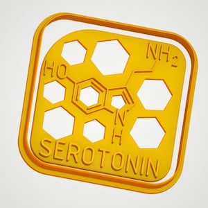 May include: A yellow 3D model of the chemical structure of serotonin, a neurotransmitter, with the word "SEROTONIN" written below the structure.