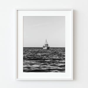 Small Fishing Boat at Sea – Black and White Photography