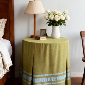 Box-pleated Chartreuse Green Table Skirt with Baby Blue Ribbon