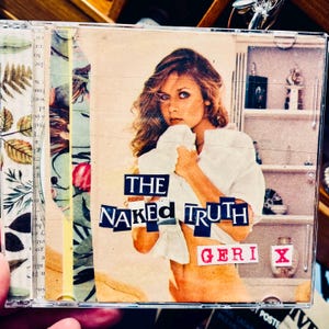 Peut inclure: Un boîtier de CD avec une photo d'une femme sur la face avant. Le titre du CD est "The Naked Truth" et l'artiste est "Geri X".