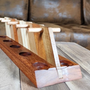 10-place wooden pipe holder