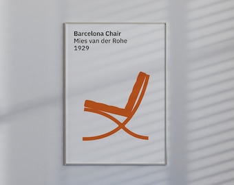 May include: A blue tufted lounge chair with a light pink side table and a brown wicker side table with a white cup and a yellow candle. A framed poster with the text "Barcelona Chair Mies van der Rohe 1929" is hanging on the wall.