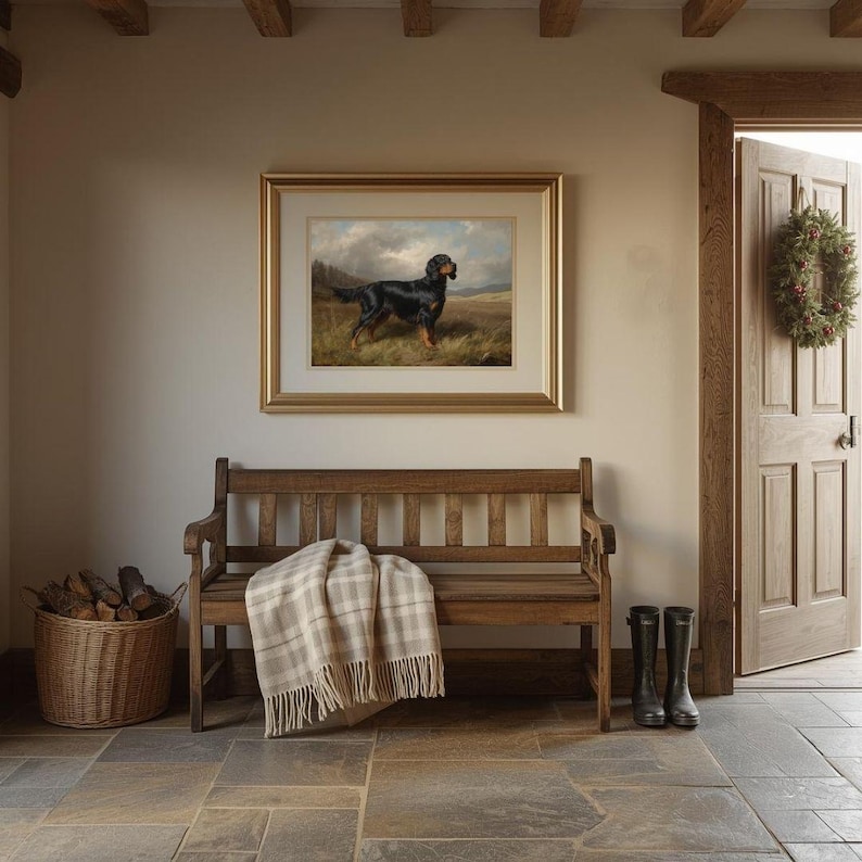 May include: A rustic entryway featuring a wooden bench with a plaid throw, a framed dog painting, and a wicker basket filled with firewood. A pair of black rain boots stands beside the bench. A wreath adorns the open doorway.