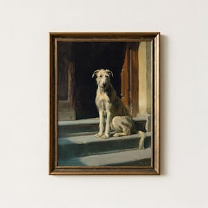 May include: A framed oil painting depicting a shaggy, light-coloured dog sitting on stone steps in front of a dark doorway. The dog has long, textured fur and is positioned in the centre of the composition. The frame is a dark, metallic brown.
