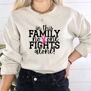 In In This Family No One Fights Alone Shirt, Cancer Awareness, Cancer Family Support, Pink Ribbon Shirt, Cancer Fighter, Pink Day Sweatshirt
