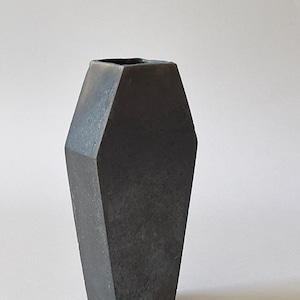 Ceramic vase in the shape of a coffin.  Fireclay mass, raku firing.