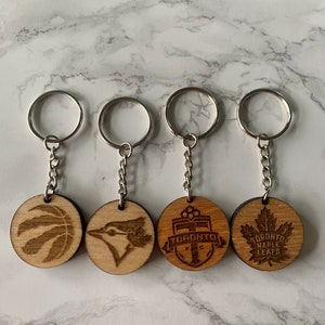 Custom Laser Engraved Wooden Keychains. Sports teams. Dog Mom. Dog Dad. Grandparent. image 4