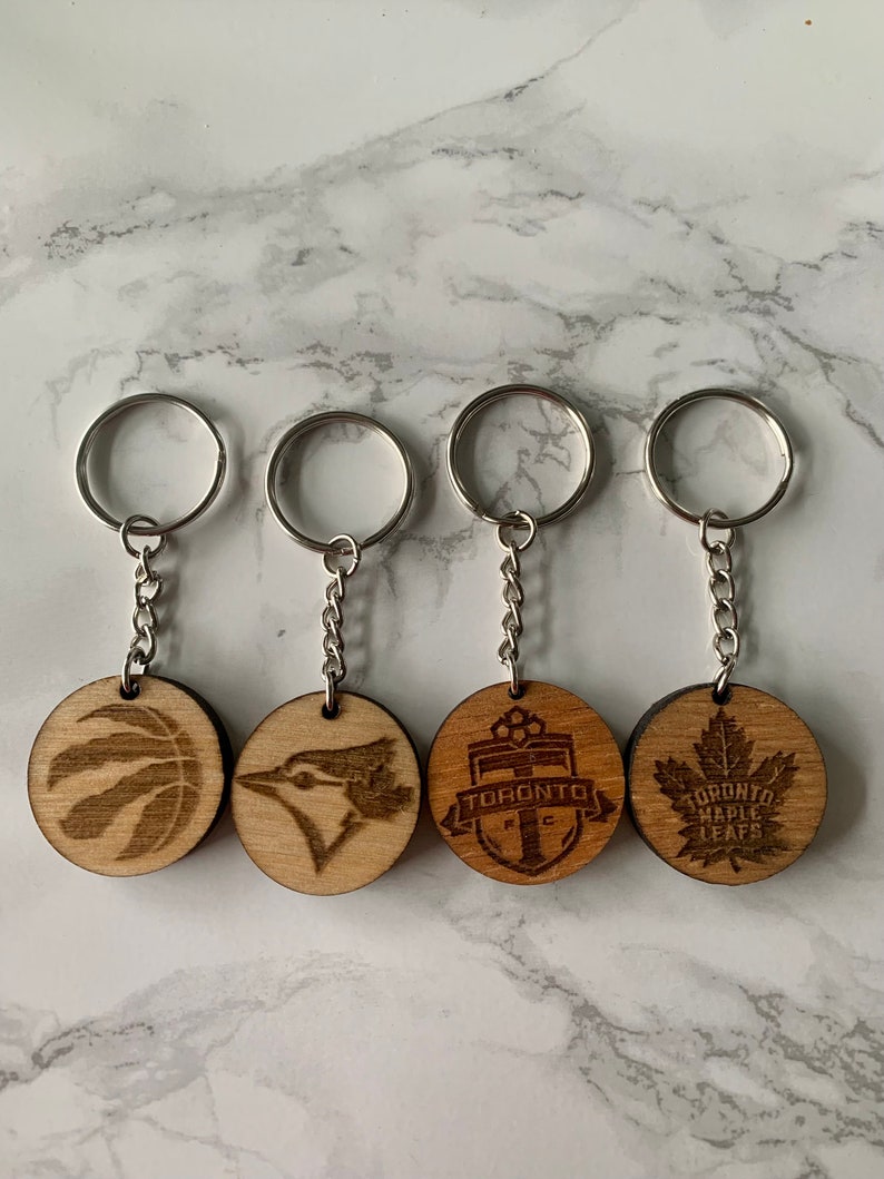 Custom Laser Engraved Wooden Keychains. Sports teams. Dog Mom. Dog Dad. Grandparent. image 4