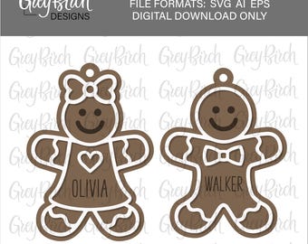 May include: Two gingerbread-shaped ornaments with white outlines. One has a bow and the name "Olivia", the other has a bow tie and the name "Walker". The ornaments are brown with white accents and are designed for digital download.
