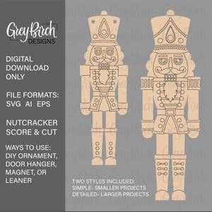 May include: Digital download file featuring two nutcracker designs in beige outlines on a gray background. Text includes Grey Birch DESIGNS, DIGITAL DOWNLOAD ONLY, FILE FORMATS: SVG AI EPS, NUTCRACKER SCORE & CUT, WAYS TO USE, and TWO STYLES INCLUDED.