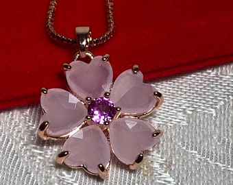 Pink flower pendant, necklace, heart shaped crystal petals, central gemstone, rose gold