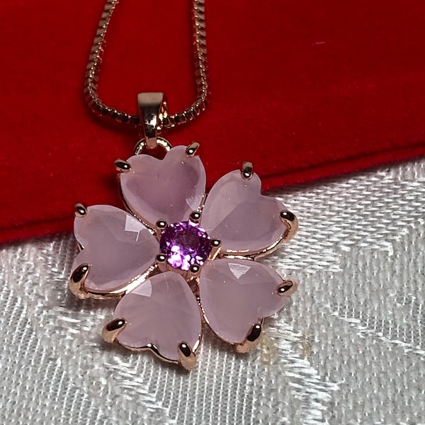 Pink flower pendant, necklace, heart shaped crystal petals, central gemstone, rose gold