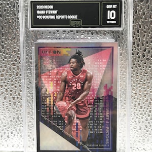 May include: A 2020 Recon Isaiah Stewart #30 Scouting Reports Rookie basketball card in a GMA slab. The card features a player in a red Motor City jersey holding a basketball, with a pink and purple background and the text 'Isaiah Stewart Pistons'.