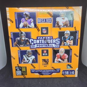 May include: A rectangular box of Panini Contenders 2024 Football trading cards. The box is yellow and blue, with images of football players and the text "MEGA BOX" and "108 CARDS INSIDE". It also states "Find 1 Autograph and 2 Memorabilia Cards!"