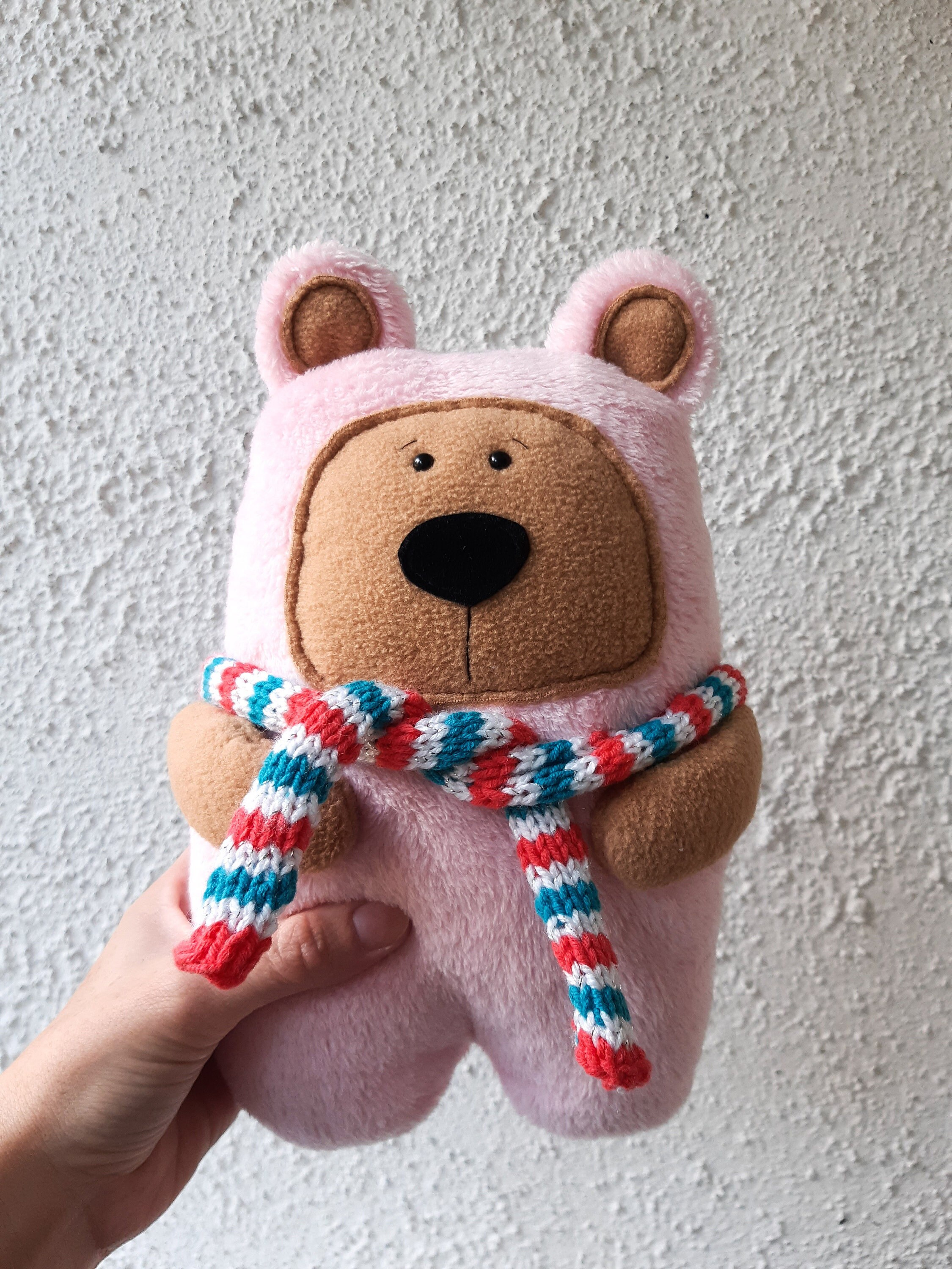 Nuka - the soft handmade teddy bear with a knitted scarf