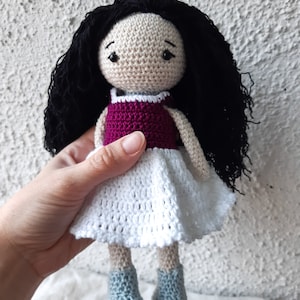 Agatka - a charming crochet doll with long black hair and cute outfit