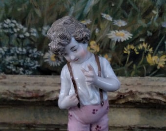 Meissen porcelain figure of young boy