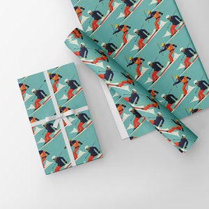 May include: Gift wrap featuring a repeating pattern of skiers in action on a teal background. The skiers are depicted in a retro style, wearing orange, black, and white outfits. A wrapped gift with a white ribbon is also visible.