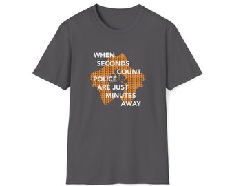 May include: A dark gray t-shirt with a white graphic design of a starburst shape with the text "WHEN SECONDS COUNT POLICE ARE JUST MINUTES AWAY".