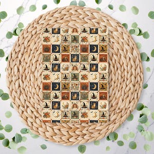 May include: A rectangular print featuring a repeating grid pattern of autumn and mystical motifs, including orange pumpkins, black cats, witch hats, crescent moons, and floral arrangements in shades of orange, cream, navy blue, and sage green.