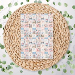 May include: A rectangular paper sheet featuring a repeating grid pattern of coastal-themed illustrations, including lighthouses, beach chairs, umbrellas, and seashells in soft shades of blue, pink, and white on a light background.