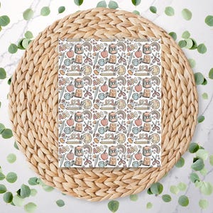 May include: A patterned design with school-themed illustrations, including backpacks, apples, pencils, scissors, and the letters "ABC" and numbers "123". The design is in soft pastel colours on a white background.