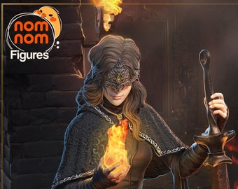 May include: A woman in a black hooded robe holds a ball of fire in her hand. She wears a black mask with intricate details and a silver belt. She is sitting on a throne with a sword at her side. The scene is lit by candles and a fire.