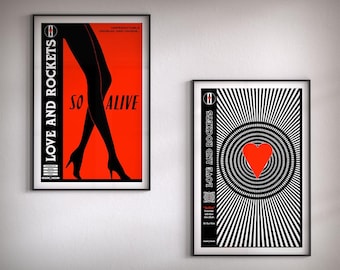 May include: Two black and white posters with the band name "Love and Rockets" printed in white. The first poster has a red background with a black silhouette of a woman's legs walking. The text "So Alive" is printed in white below the legs. The second poster has a black and white circular pattern with a red heart in the center. The text "So Alive" is printed in white on the left side of the poster.