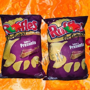 May include: Two bags of Ruffles potato chips, both with the flavor "Sabora Presunto" and the Portuguese flag. The bags are purple with a red and white logo.