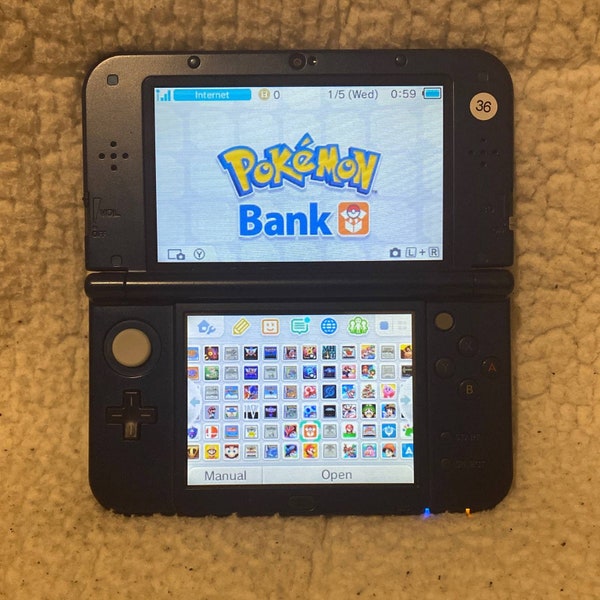 New Nintendo 3DS XL in Blue Bundled w/ 64gb SD, Games, Stylus and Charger