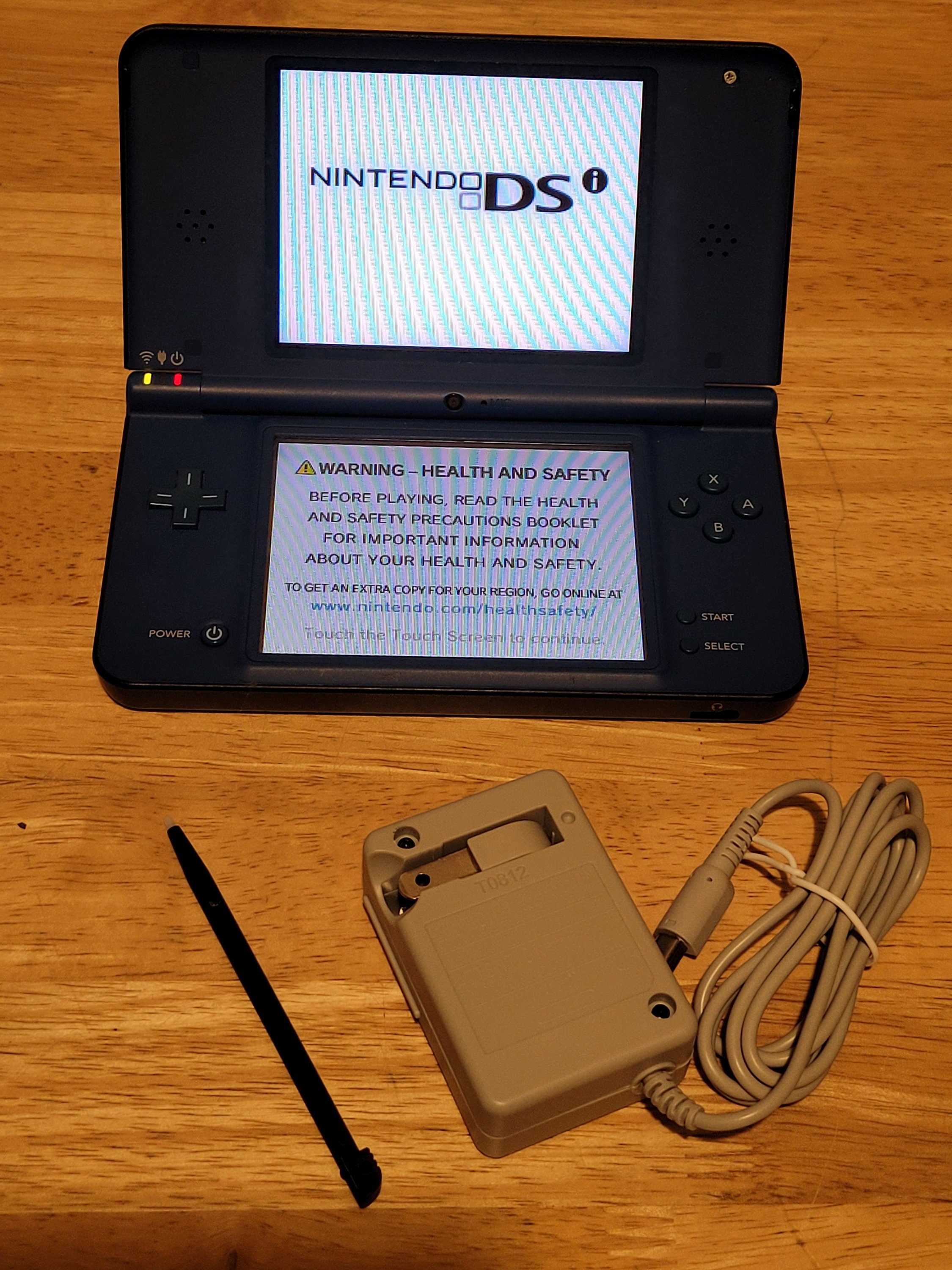 Nintendo DSi Orange handheld system Console