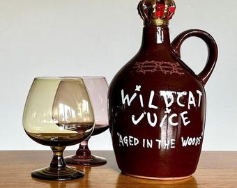 Vintage Wildcat Juice “Aged in The Woods” Pottery Jug | Red and Gold Glazed Crown Stopper | Mid-Century Barware | Bellarine Bazaar