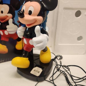 Teléfono de viaje vintage de Mickey Mouse Tyco de los años 80, con mochila, caja e instrucciones. imagen 1