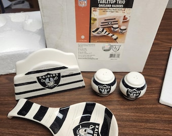 Juego de salero y pimentero de cerámica vintage de los Oakland Raiders de la NFL para mesa.
